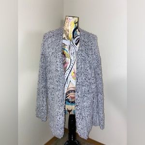 Heavy cardigan. Very warm not sure what brand. Size: M.